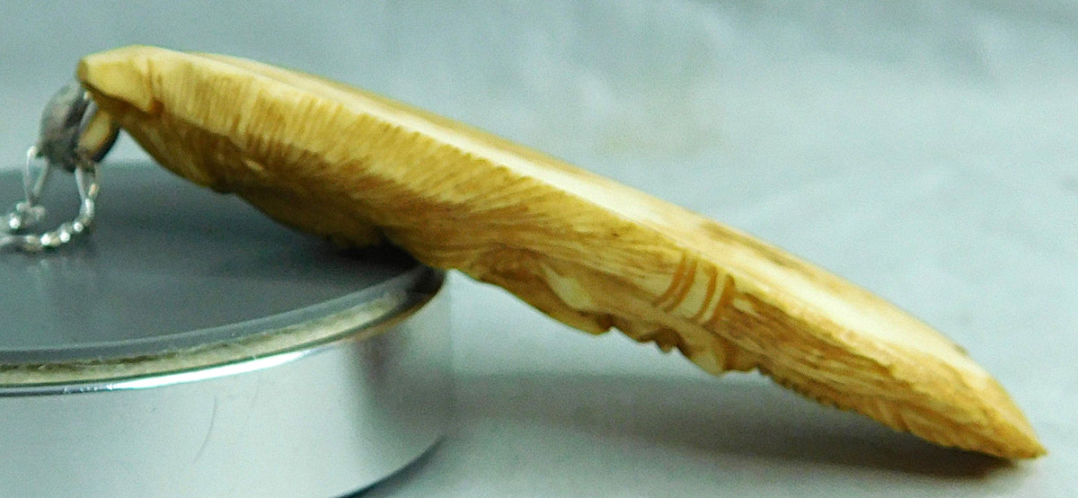 Light Blue Navajo Hand Carved Bison Bone Pendant