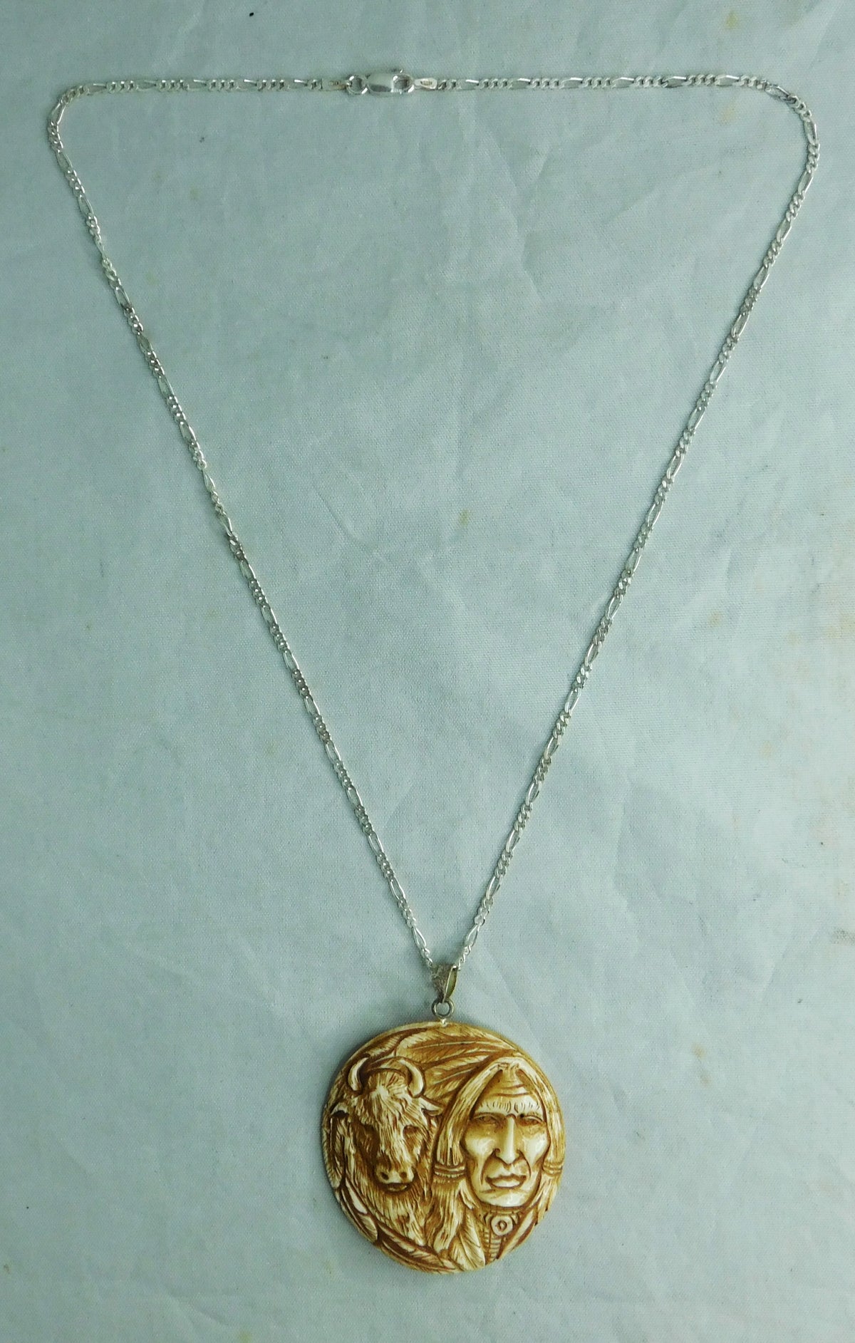 Gray Navajo Hand Carved Bison Bone Pendant
