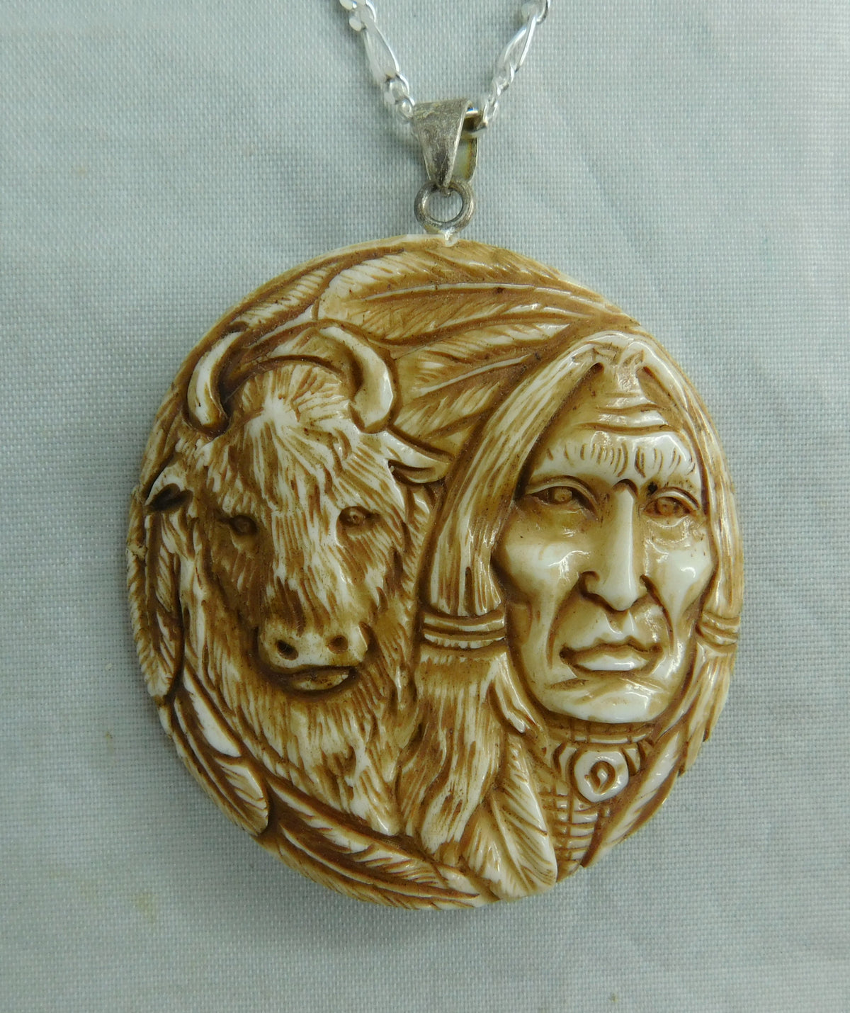 Dark Gray Navajo Hand Carved Bison Bone Pendant